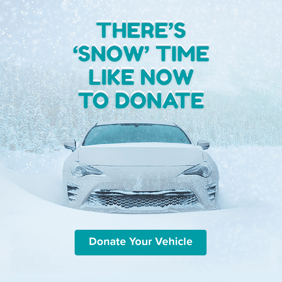 Car buried in snow for a car donation promotion for WMPG